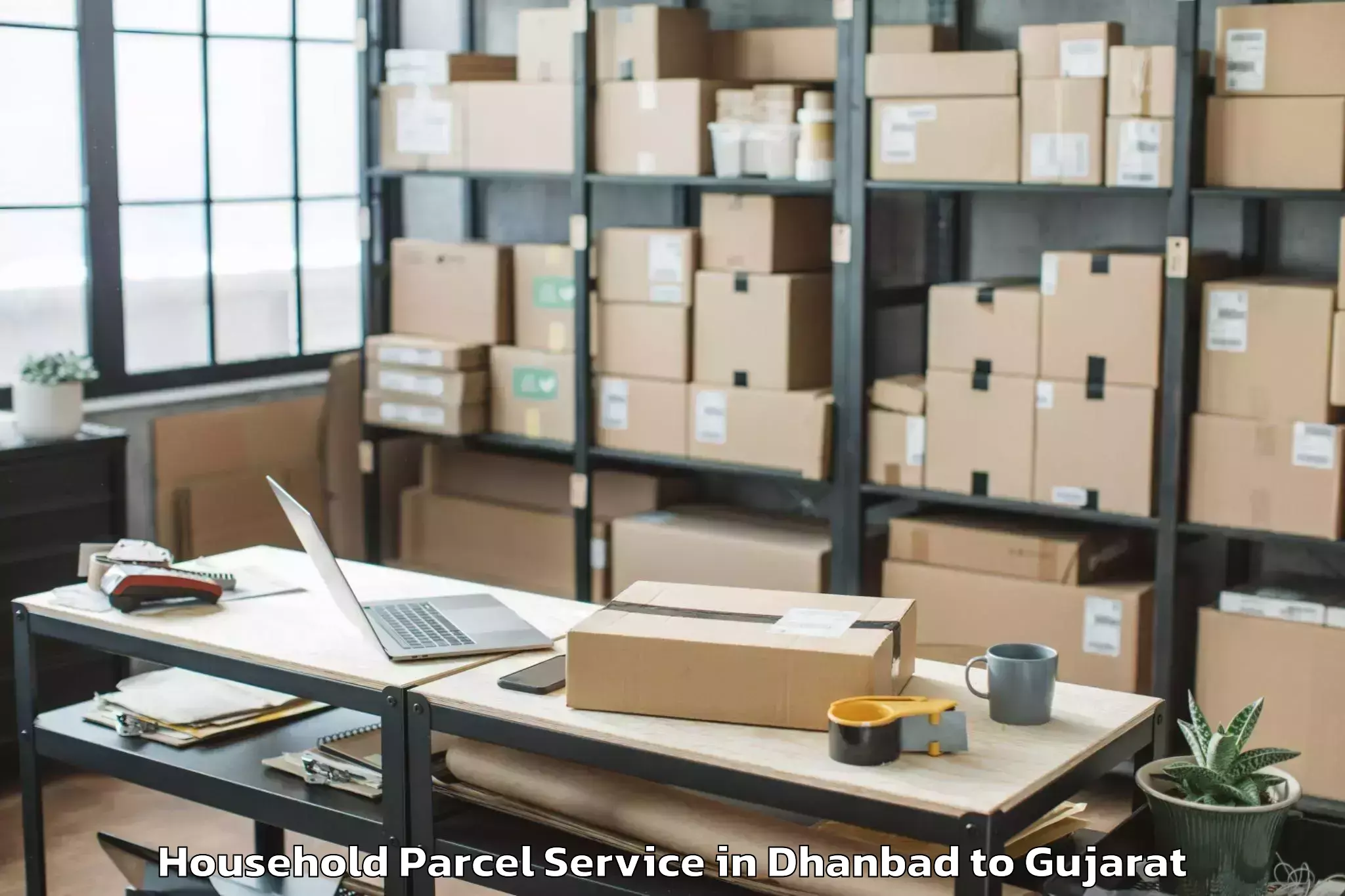 Easy Dhanbad to Koyali Household Parcel Booking